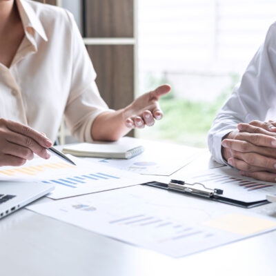Executive Business team presentation conference on meeting to pl Executive Business team presentation conference on meeting to planning investment project working and strategy of business making conversation with partner, financial and accounting concept.